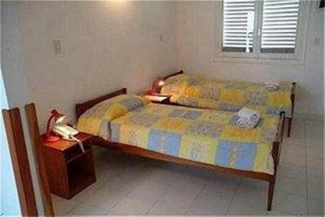 Hotel Palmas Del Sol أسونسيون الغرفة الصورة